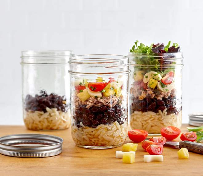 Orzo salad with black beans, tuna, capers, tomatoes and basil marinated legumes