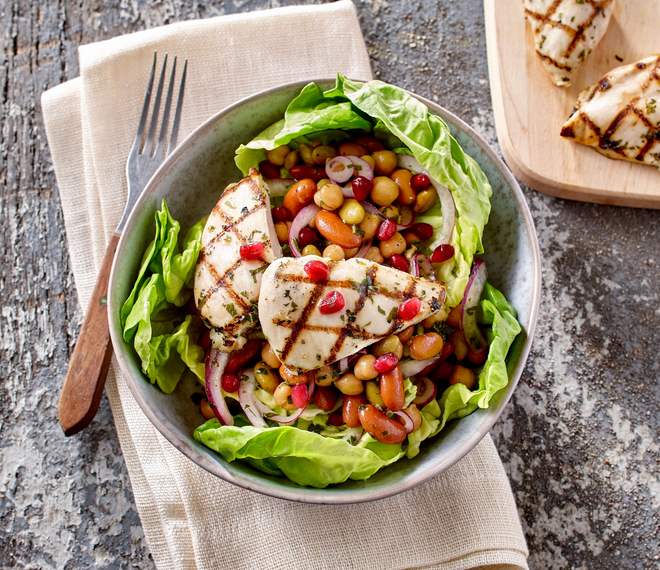 Pomegranate and bean salad with grilled chicken