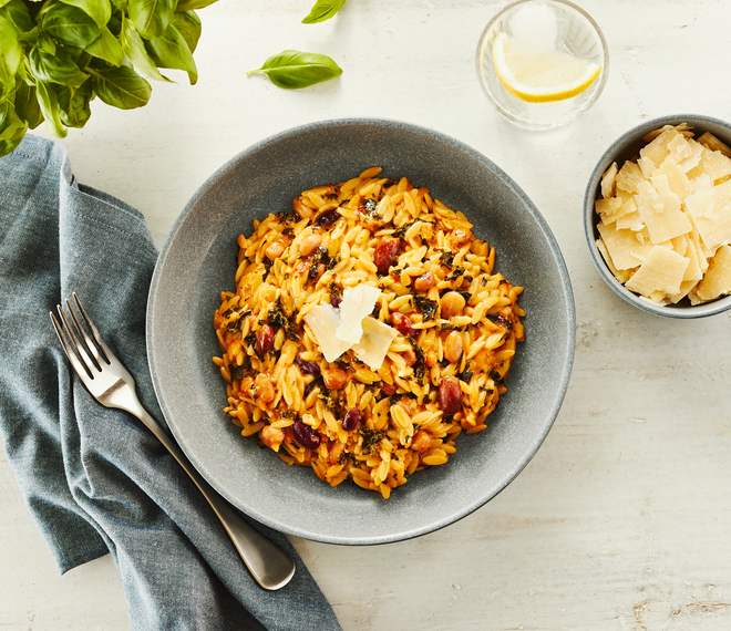 Creamy Orzotto with 6 legumes, Pesto Rosso and Kale