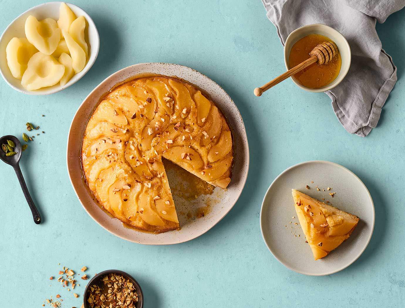 Upside-down pear and cardamom cake