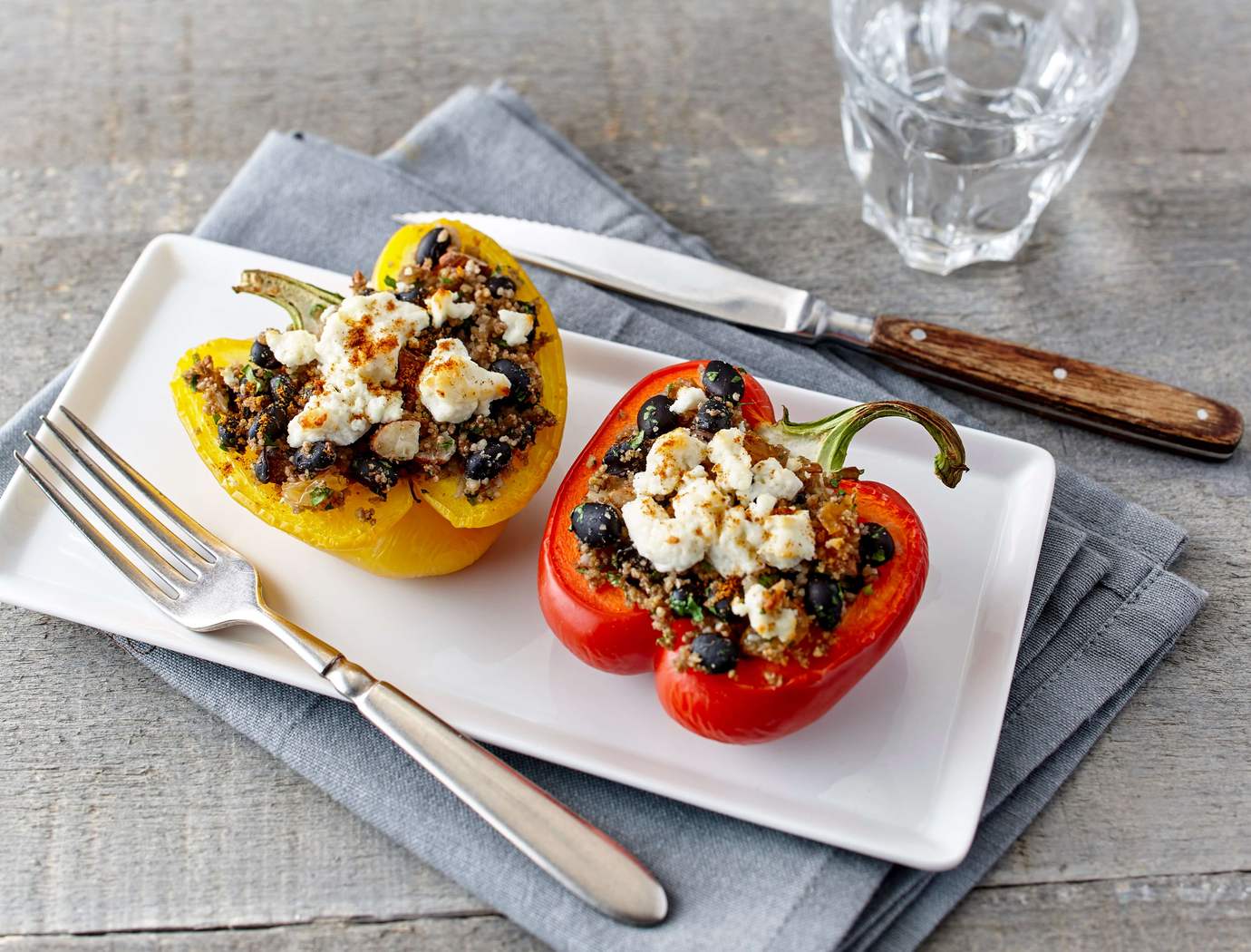 Stuffed peppers with couscous, dried fruit and almonds