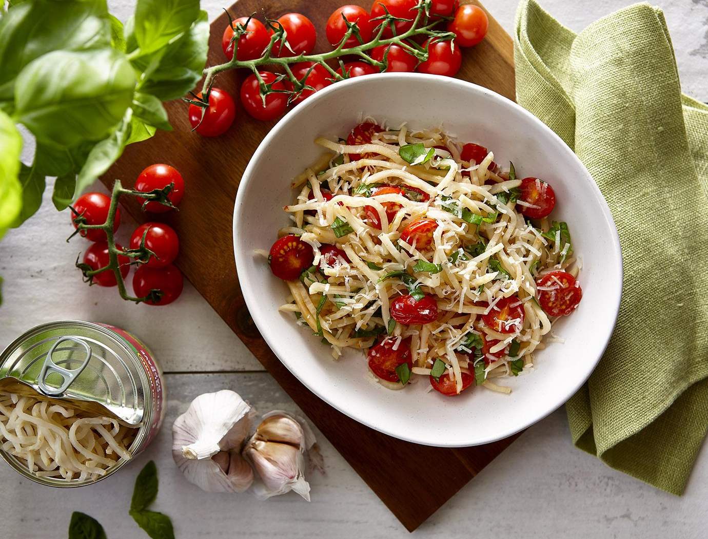 Celery root spaghetti with tomatoes and basil